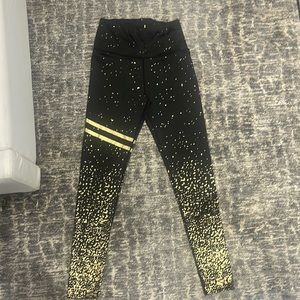SHEIN leggings. Black with gold detail/design.